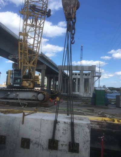 Underwater concrete and metal cutting to foundation for selective demolition.