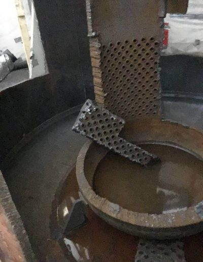 A mercury generator part of selective demolition metal cutting project.