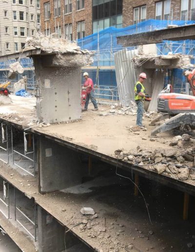 Robotic hammering machine used as concrete breaker.