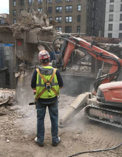 Robotic hammering machine used as concrete breaker.
