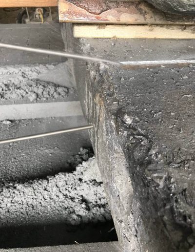 Wire sawing of metal zinc bar.