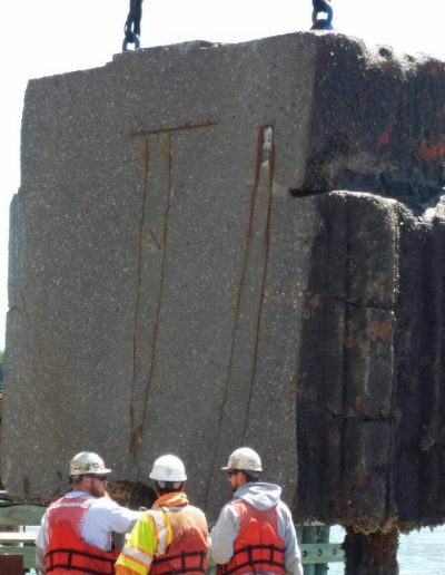 Underwater concrete and metal cutting to foundation for selective demolition.