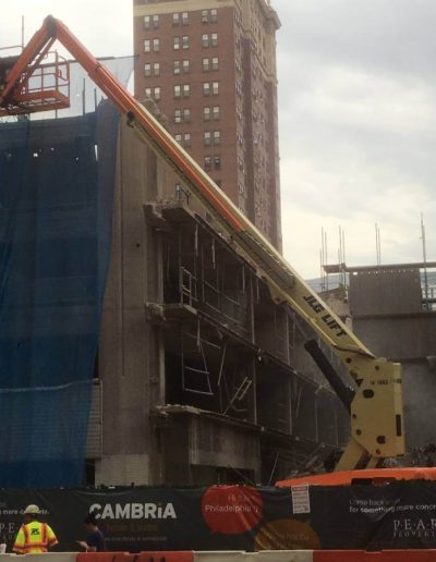 Robotic hammering machine used as concrete breaker.