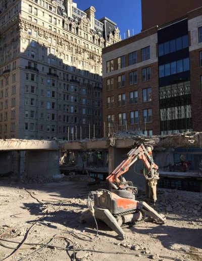 Robotic hammering machine used as concrete breaker.