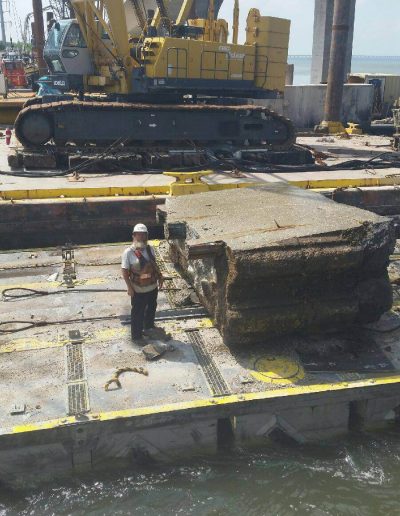 Underwater concrete and metal cutting to foundation for selective demolition.