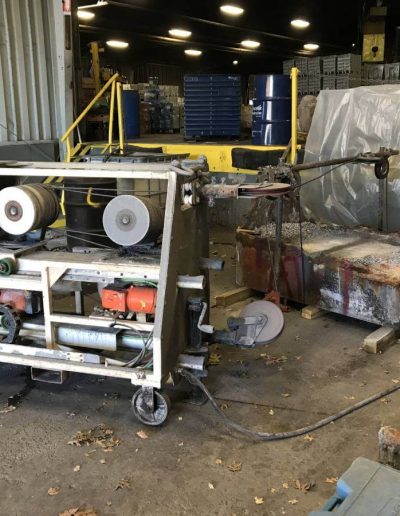 Wire sawing of metal zinc bar.