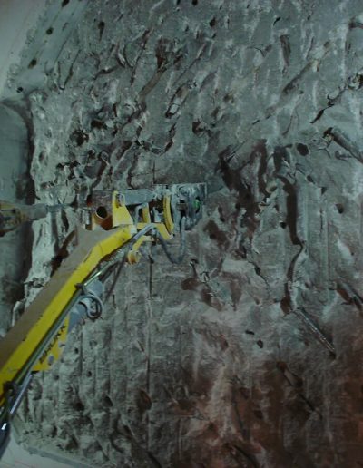 Large robotic hammering machine at work.