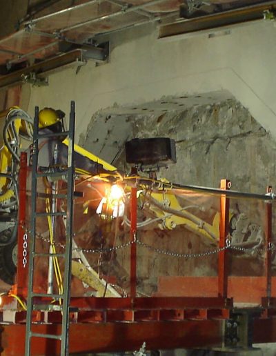 Robotic hammering work being done.