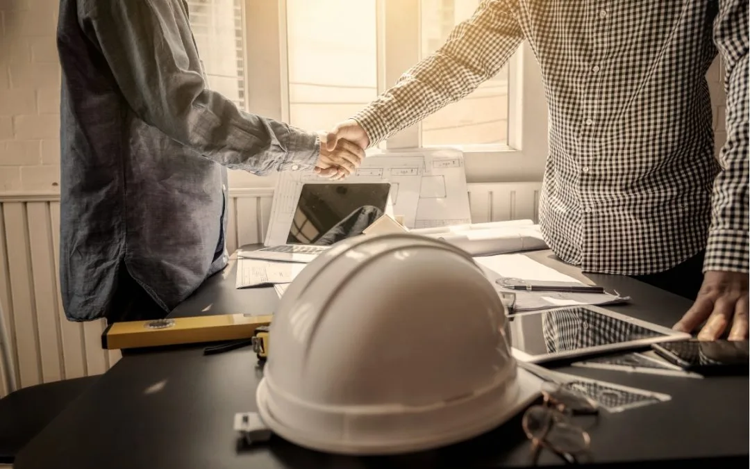 Contractors discussing a performance versus payment bond.
